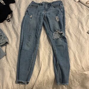 Women's Distressed Blue Jeans